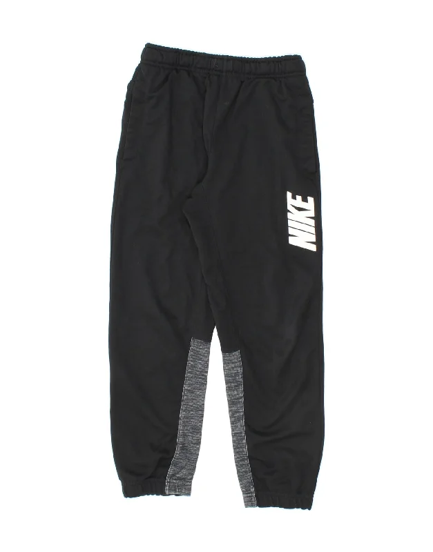 Economic Outlook NIKE Boys Graphic Tracksuit Trousers Joggers 10-11 Years Medium Black